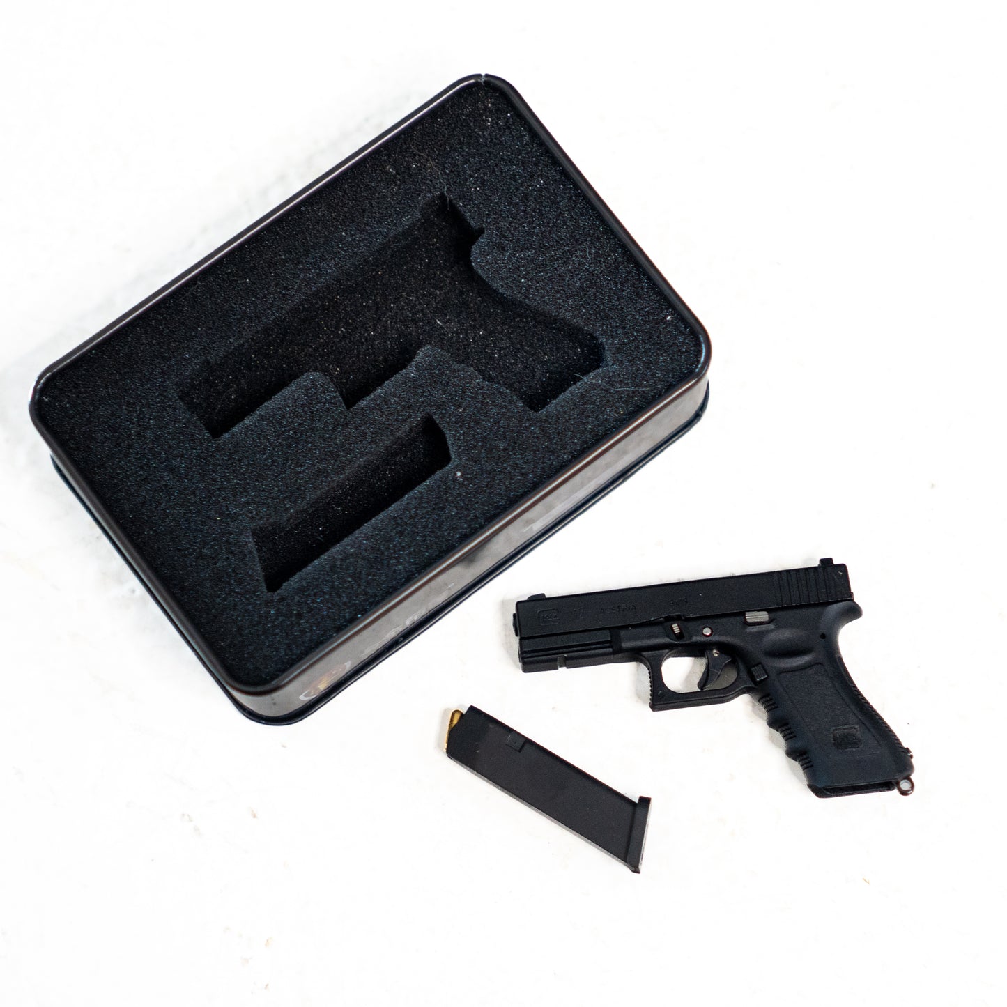 Mini Glock-Style Shell Ejecting Keychain